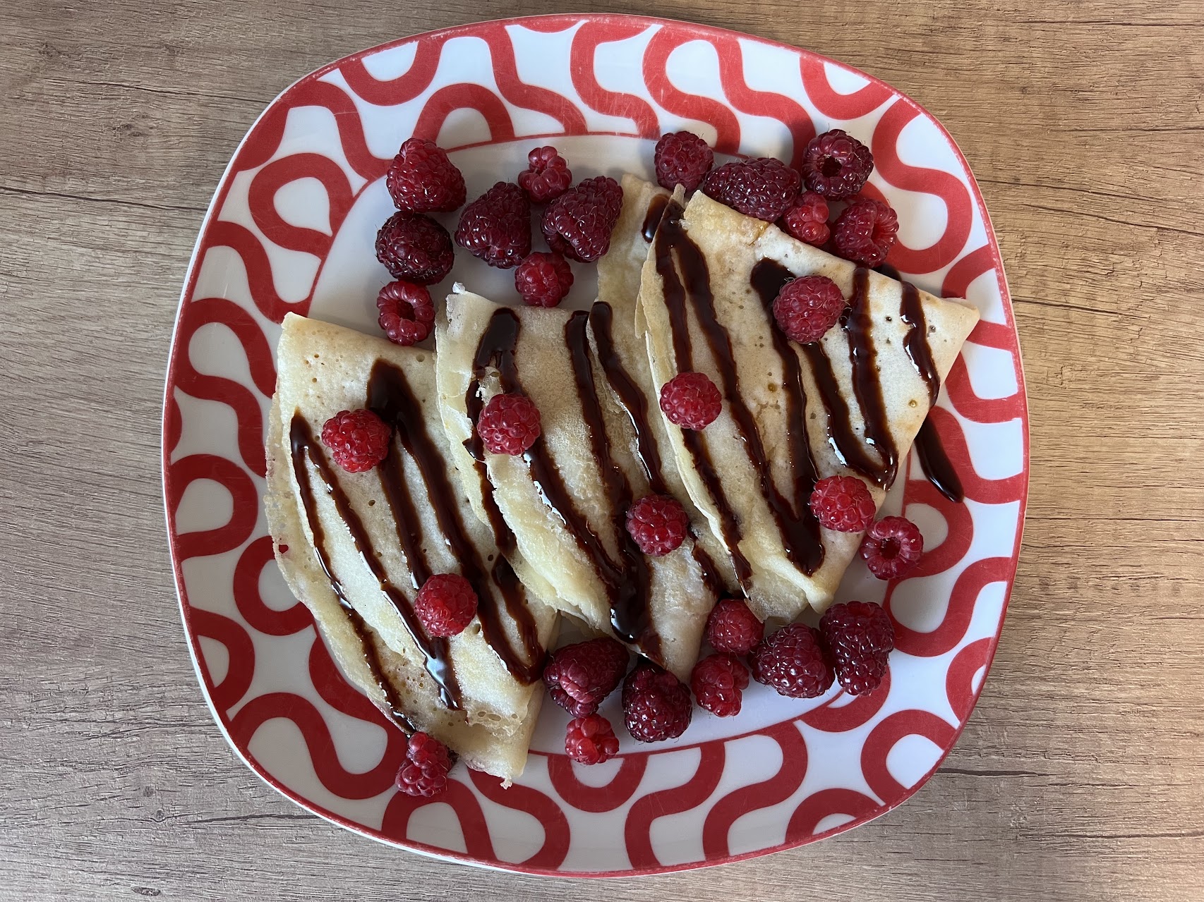 Vegan Crepes with Raspberries and Chocolate